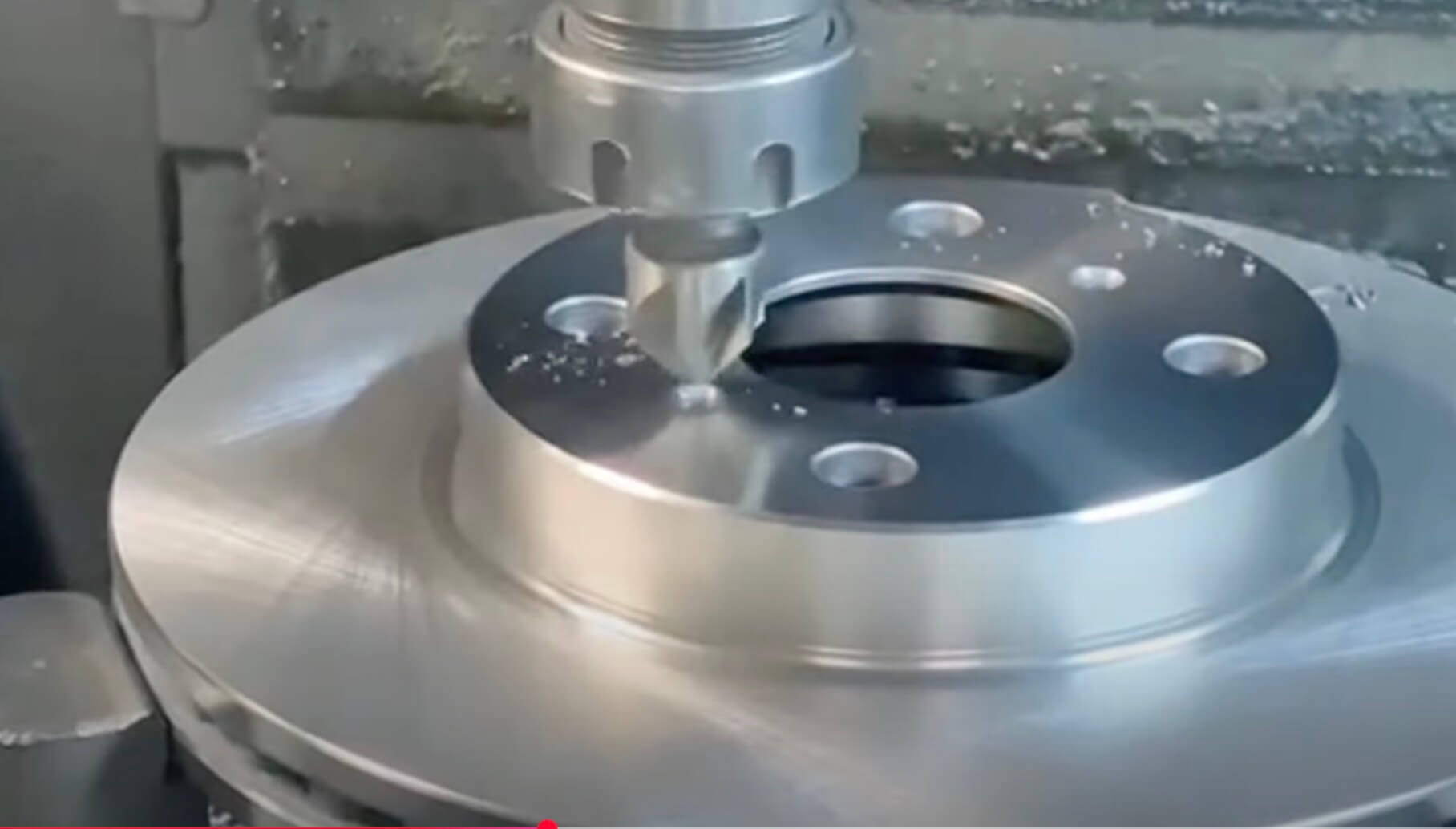 Thread tapping on a round workpiece
