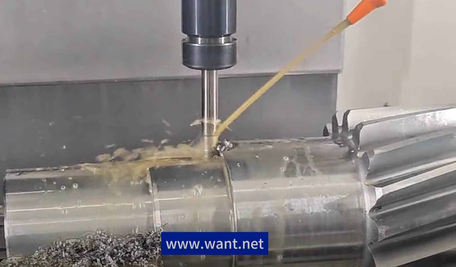 Milling a groove on the surface of a cylinder